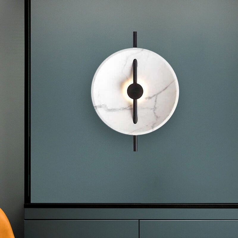 Stylish round marble effect wall sconce, resin and LED light for warm home decor.