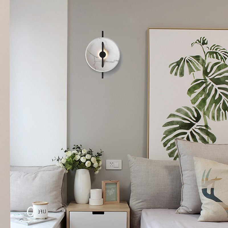 Contemporary round Marbelleo sconce, marble effect LED for decorative wall lighting.