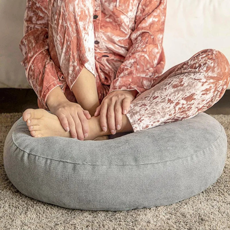 Relaxing round meditation cushion. Enhance comfort & create a peaceful zen atmosphere at home.