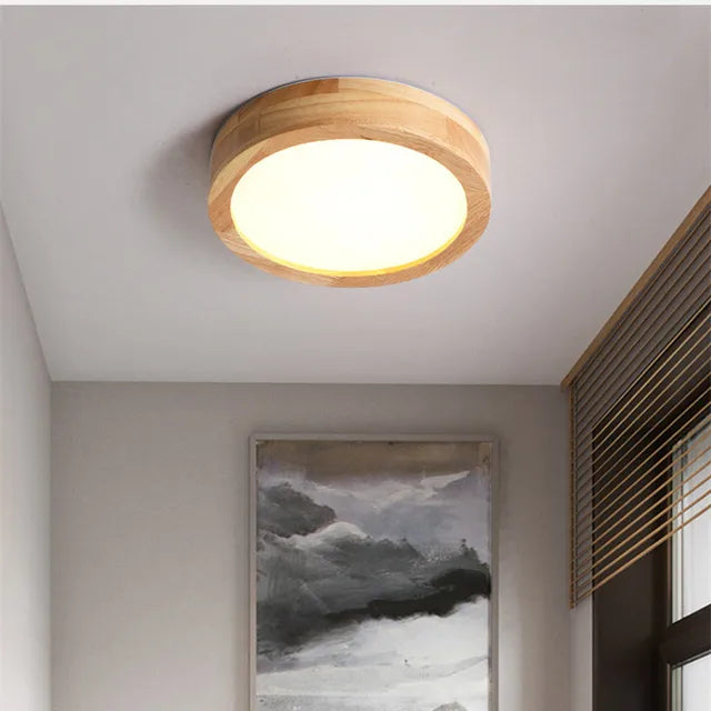 Natural wood round ceiling lamp, a Nordic style fixture providing ambient lighting for any room.