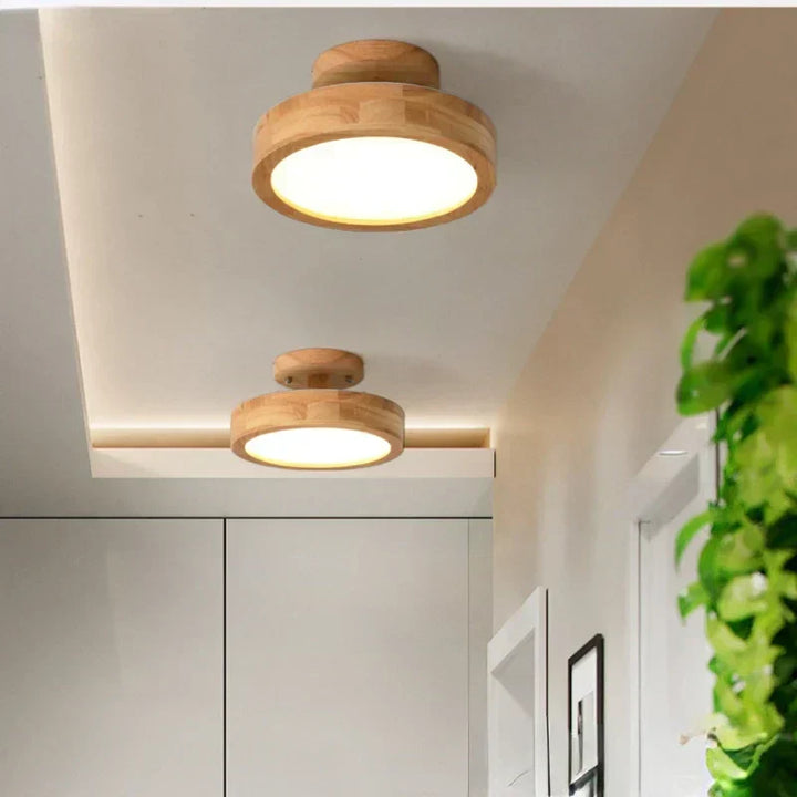 Minimalist round wooden LED ceiling light, ideal for Scandinavian interior design & home lighting.