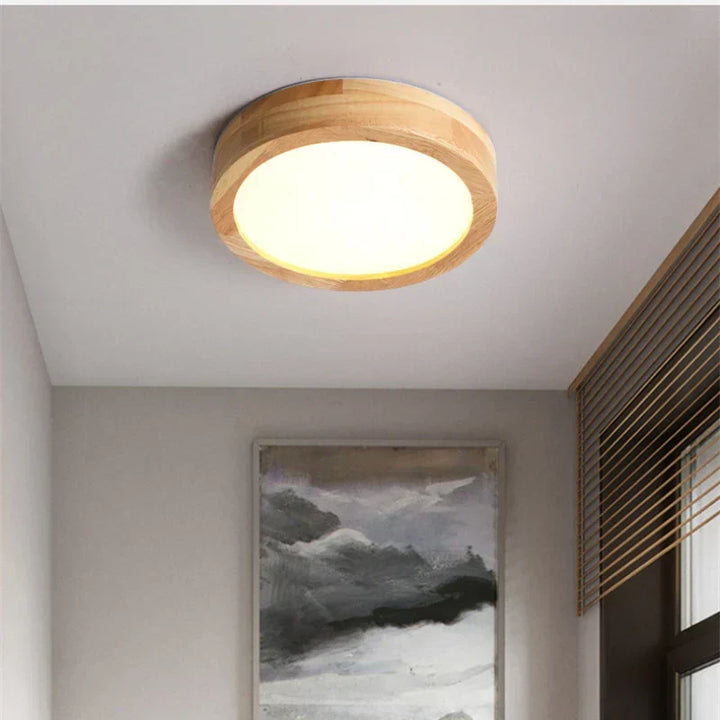 Elegant round wooden ceiling lamp, offering a modern, minimalist aesthetic for contemporary spaces.
