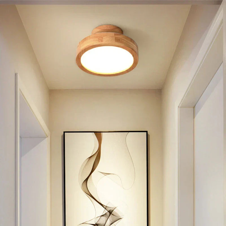 Contemporary round wooden ceiling light, a versatile Nordic-inspired fixture for diverse interior design.