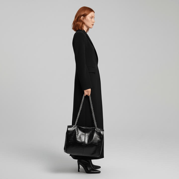 Elegant ruby tailored long coat for women, perfect for modern evening wear & classic city fashion.