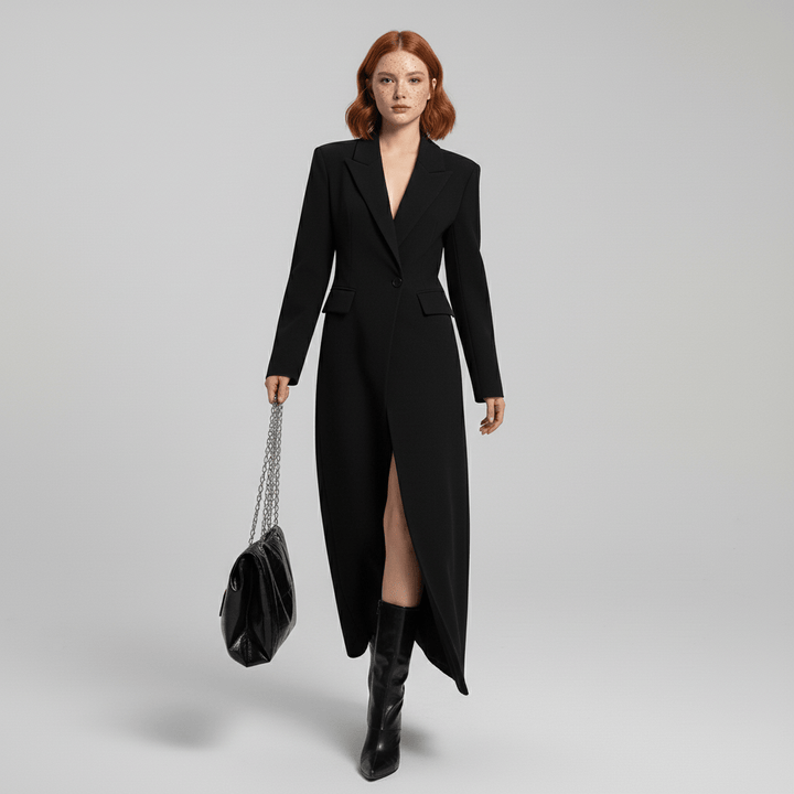 Fitted ruby long tailored coat for women, showcasing modern elegance and sophisticated style.