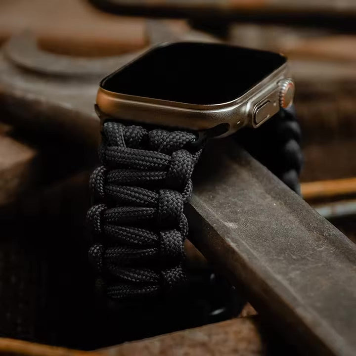 Unisex sport Apple Watch band. Adjustable, rugged watch strap for active wear. Durable replacement accessory.