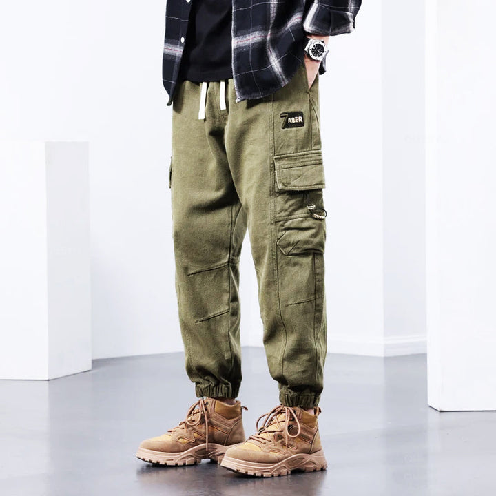 Comfy multi-pocket men's cargo pants, perfect for casual style, outdoor utility & everyday rugged wear.