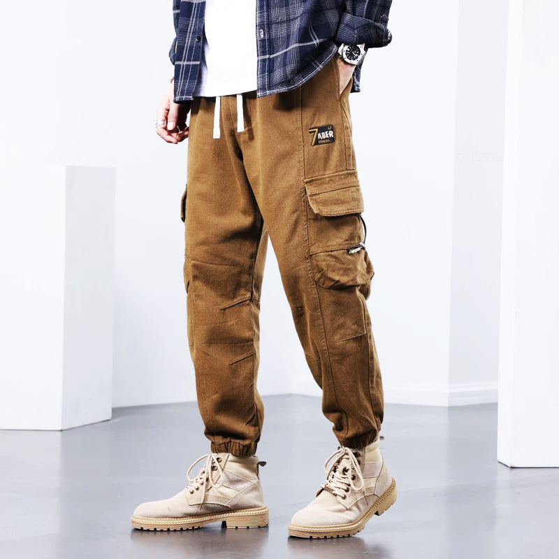 Versatile men's outdoor cargo pants, rugged & stylish, designed for durability and everyday comfort.