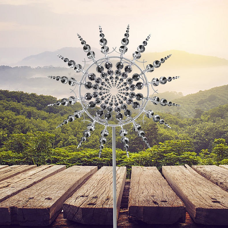 Weather-resistant metal wind spinner for garden and patio. This rust-resistant kinetic outdoor decor adds yard art.