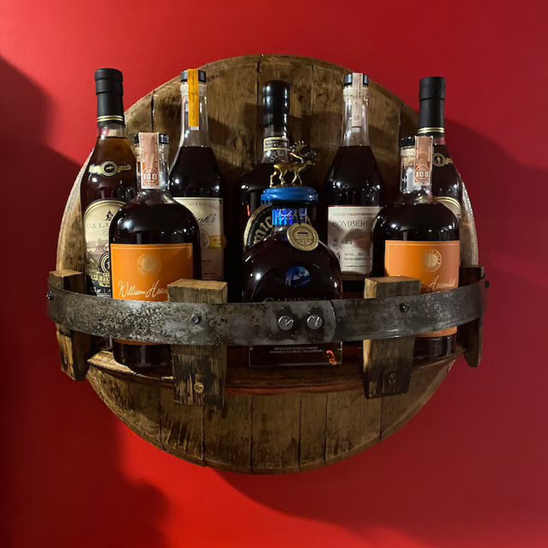 Handcrafted bourbon barrel wall shelf for kitchen storage or home bar, robust oak and metal design.