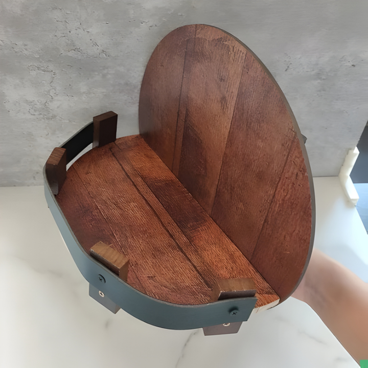 Elegant rustic bourbon whiskey barrel shelf enhancing a home bar with charming, reclaimed wood decor.