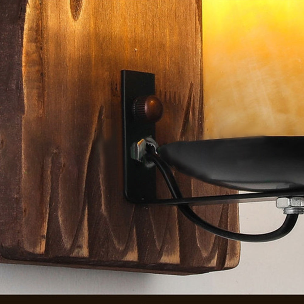 Vintage-inspired wall sconce, a stylish addition to any farmhouse or rustic home.