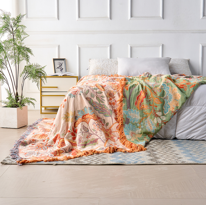Unisex rustic floral cotton throw blanket, great as a cozy decorative piece or picnic blanket.