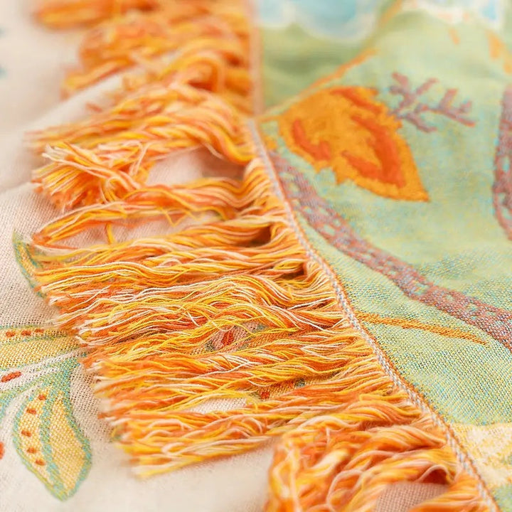 Decorative floral cotton throw, perfect for bohemian home accents or as a soft, washable blanket.