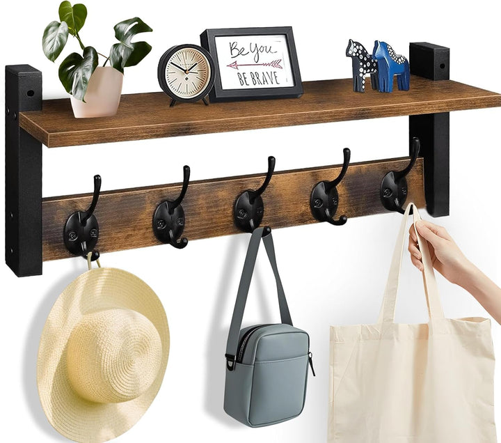 Ravora wall-mounted coat rack; wooden shelf, five dark metal hooks, rustic decor.