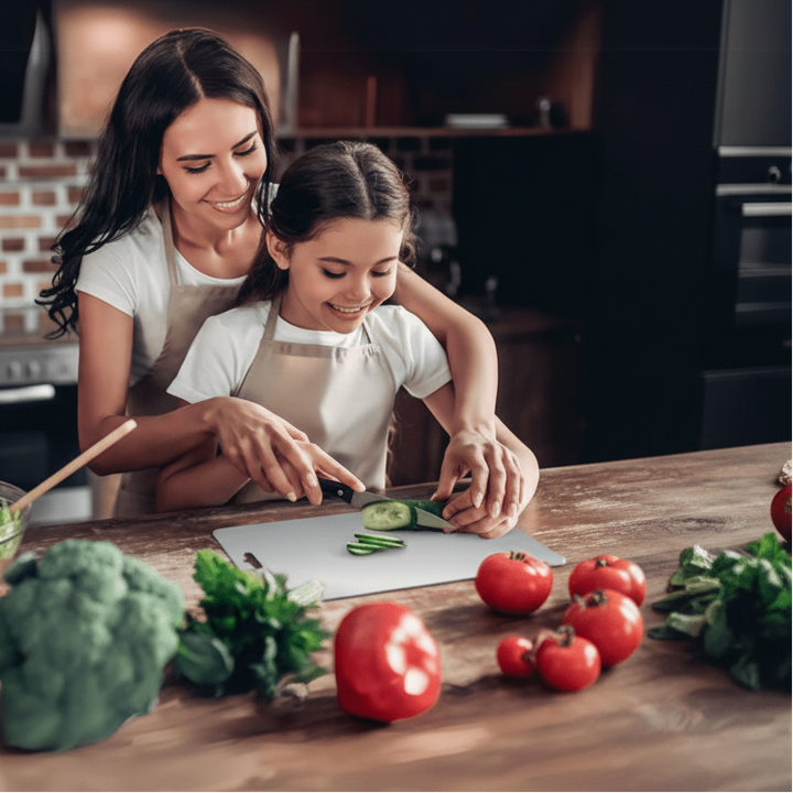 Chef chopping vegetables on a sleek, rustproof stainless steel cutting board, perfect for efficient food prep.
