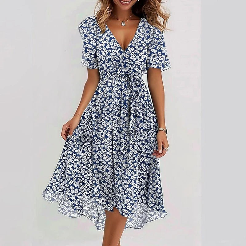 Women's V-neck wrap midi dress in sage green, delicate flutter sleeves & flowy ruffle hem. Perfect for summer.