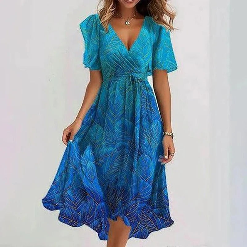 Elegant floral print women's wrap V-neck midi dress with charming flutter sleeves & a flowing hem.