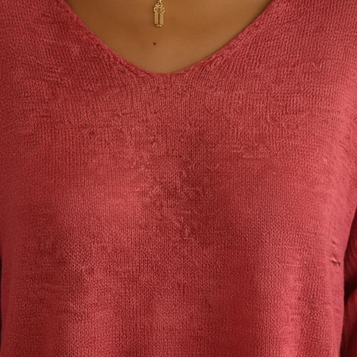 Model wearing Sapphira women's lightweight V-neck knit top, perfect casual summer top