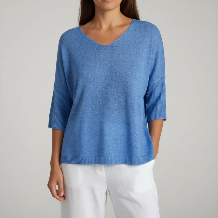 Back view of Sapphira women's V-neck knit top, versatile layering piece for spring