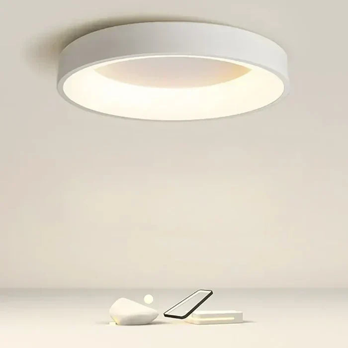 Scandinavian round LED ceiling lamp for modern home lighting. Energy-efficient & stylish ambient light.