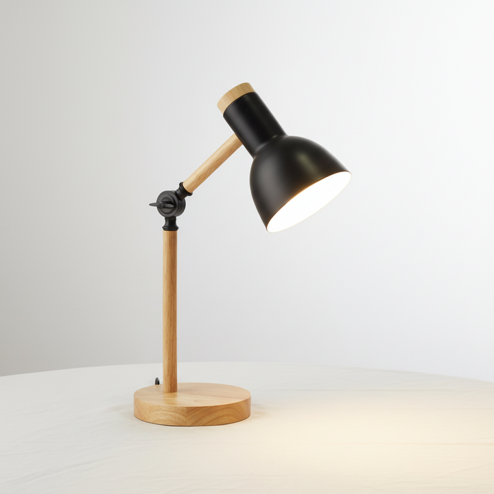 Elegant Scandinavian table lamp. Natural wood & metal design, perfect for bedside lighting or accenting modern spaces.