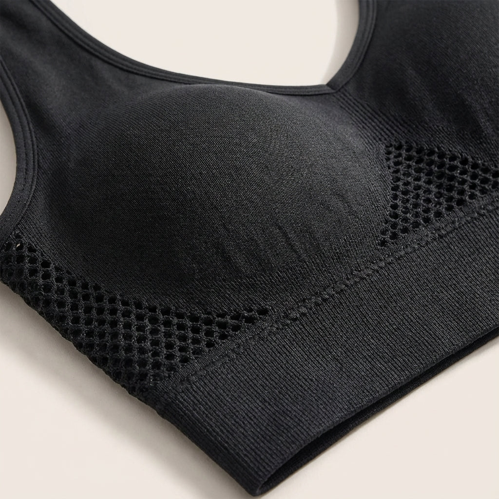 Woman wearing Bianca seamless corrective sports bra, back view, supportive compression fit