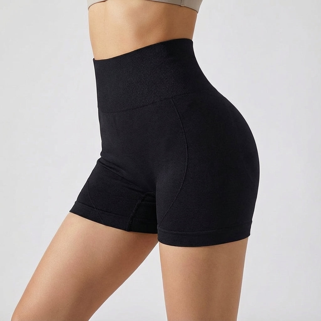 Seamless high-waisted athletic shorts in grey, designed for women's gym & active lifestyles