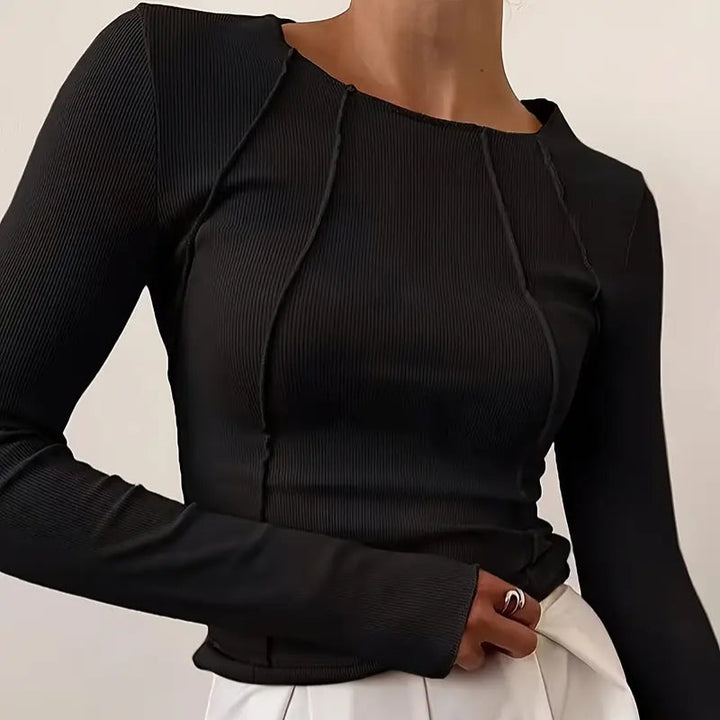 Flattering women's slim fit seamless top, enhancing your silhouette. Versatile for casual or elegant everyday style.