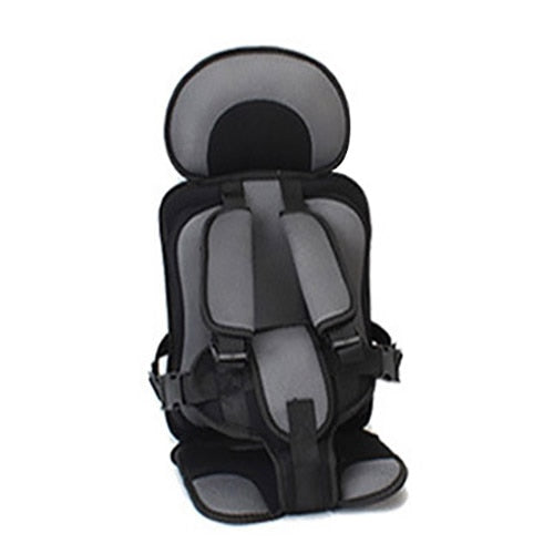 Secure infant car seat, padded with breathable fabric for ultimate comfort and auto safety.