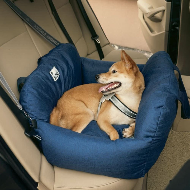Washable pet booster seat for car, non-slip base; comfortable, secure dog travel solution.
