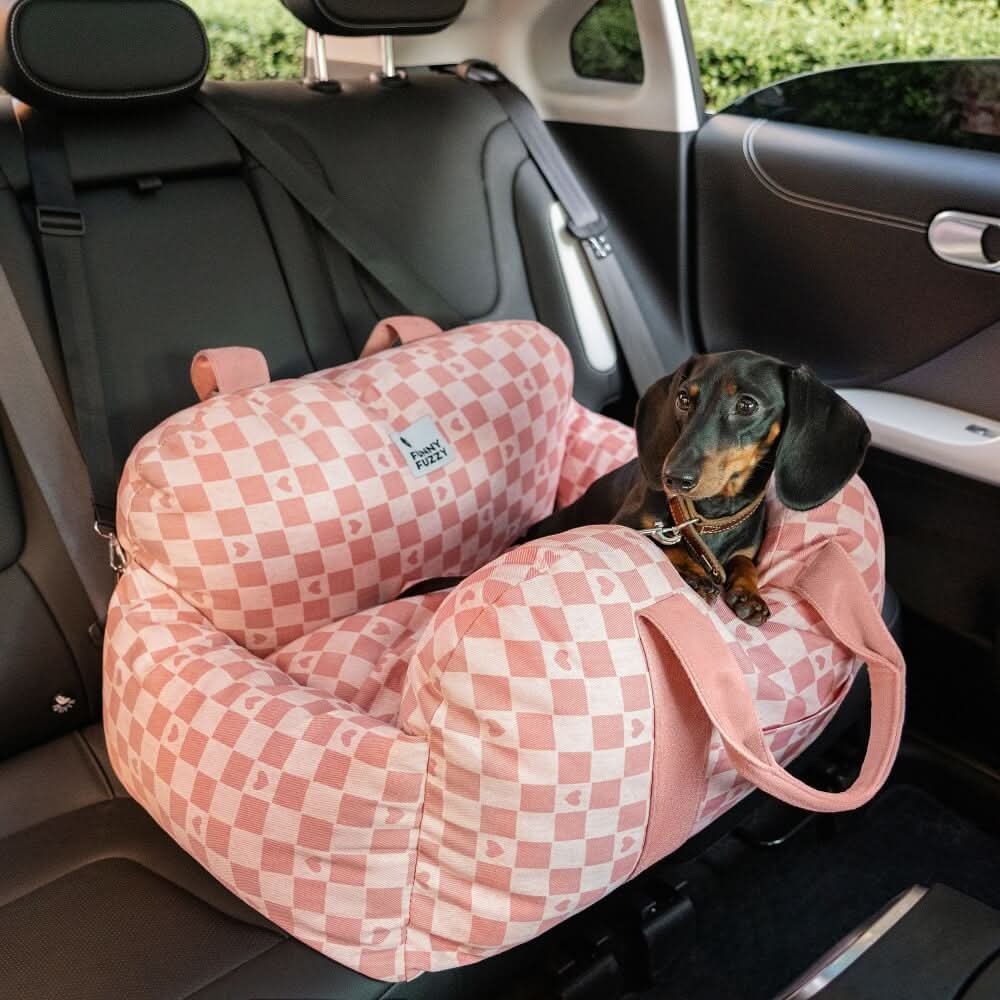 Pet car safety seat, plush and comfortable; secure dog booster seat for relaxed travel.