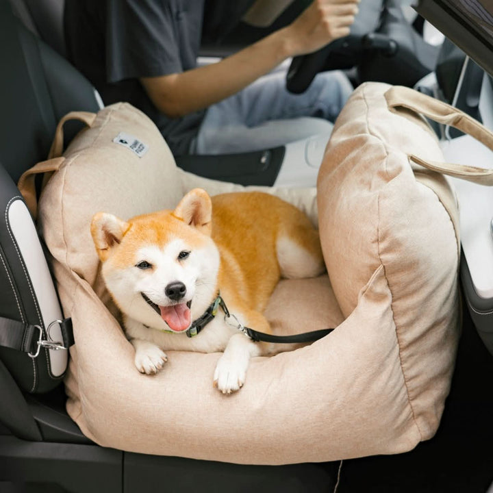 Easy-install dog car booster seat; secure pet travel bed ensuring comfort & safety for your dog.