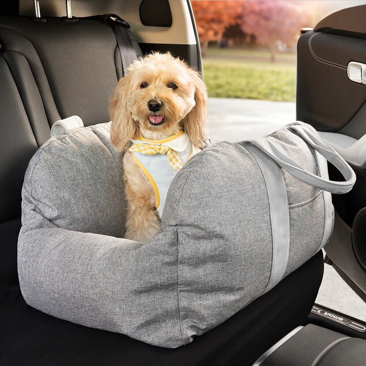 Washable dog car booster seat with strong buckles; secure, comfortable pet travel solution.