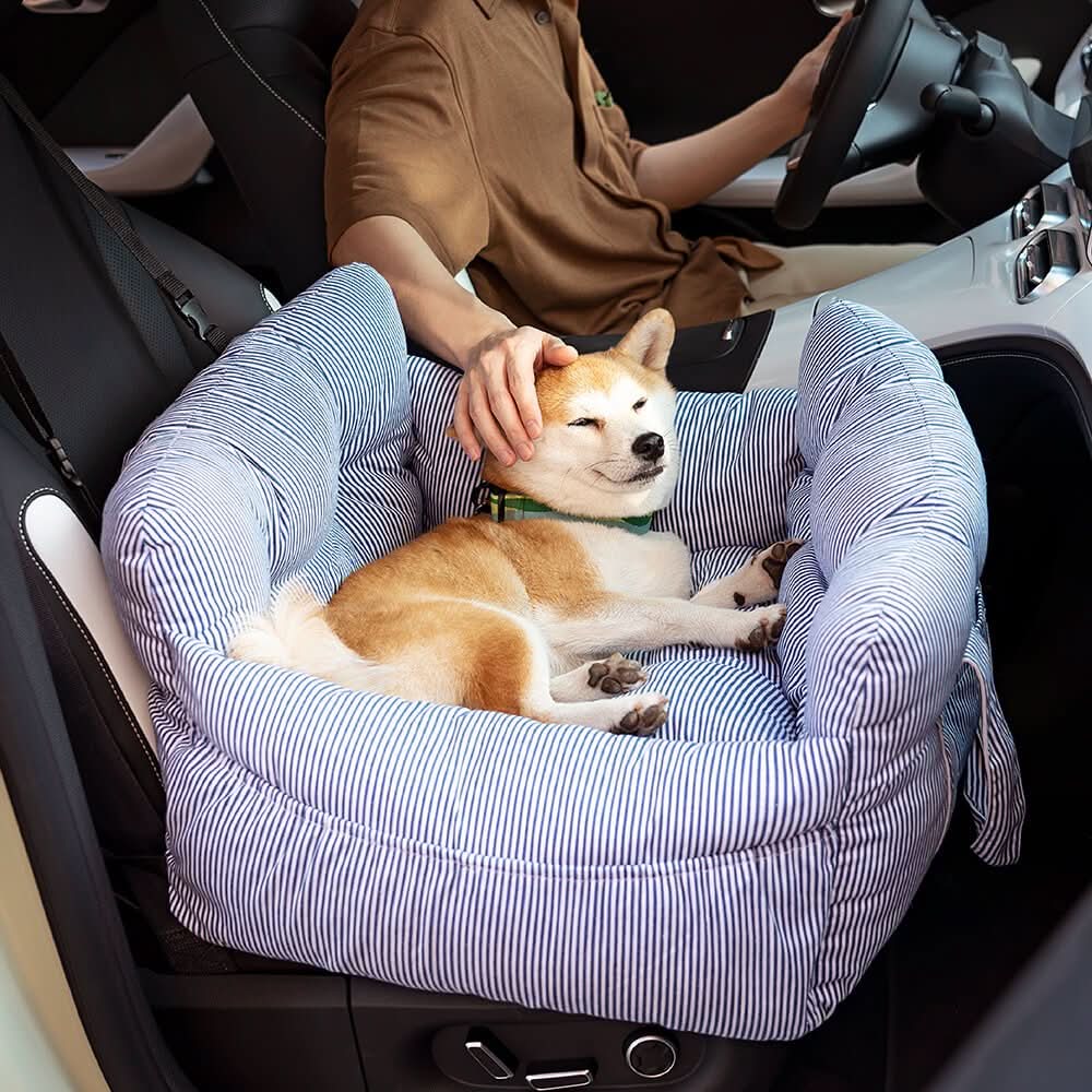 Secure pet travel bed, a comfortable dog car booster seat; ensures safety and enjoyment.