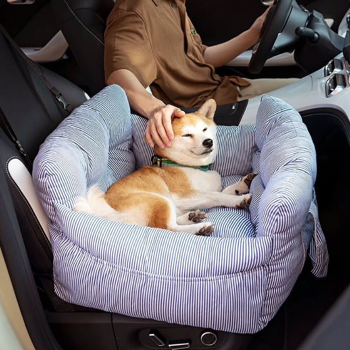 Secure pet travel bed, a comfortable dog car booster seat; ensures safety and enjoyment.