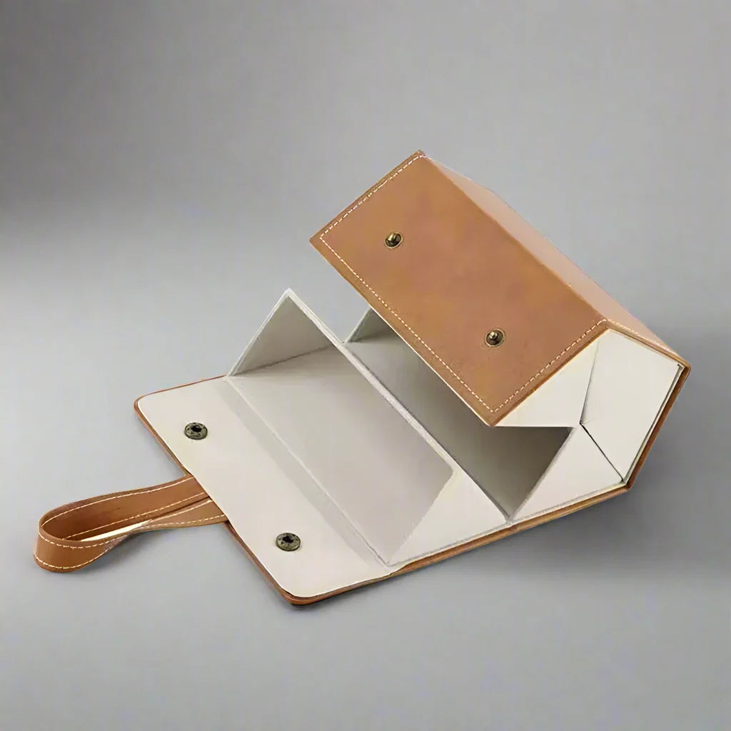 Versatile multi-slot eyewear organizer. Keeps glasses, sunglasses & reading glasses safe and tidy while traveling.