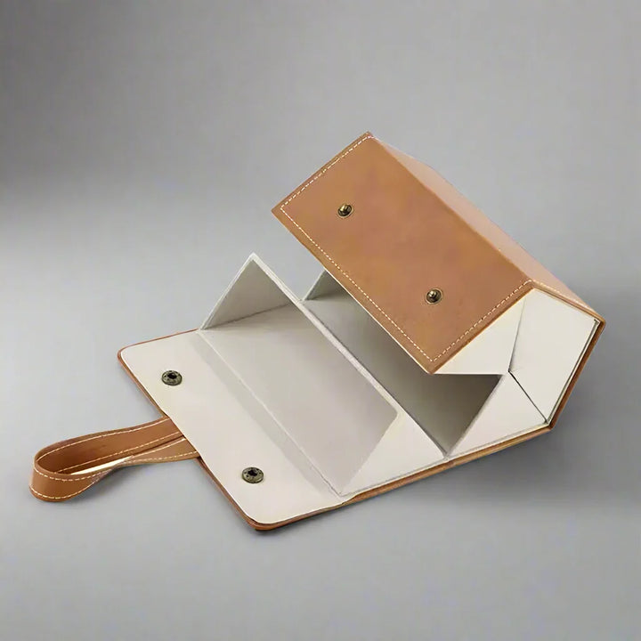 Versatile multi-slot eyewear organizer. Keeps glasses, sunglasses & reading glasses safe and tidy while traveling.
