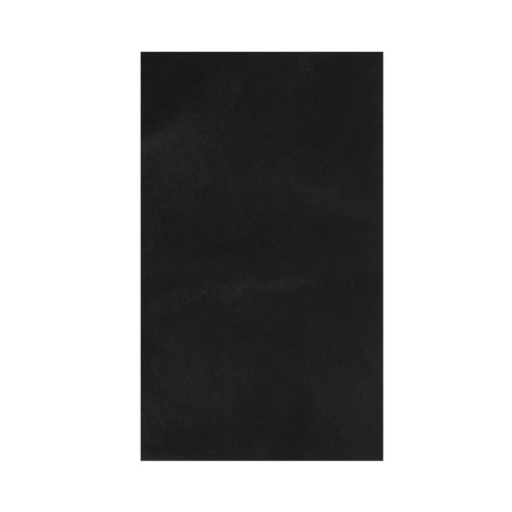 Self-adhesive leather repair patch for damaged furniture upholstery.