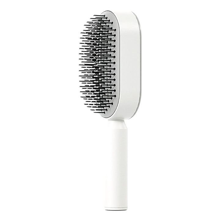 Fuchsia self-cleaning detangling brush. Gentle scalp massage and effective hair care for all hair types.