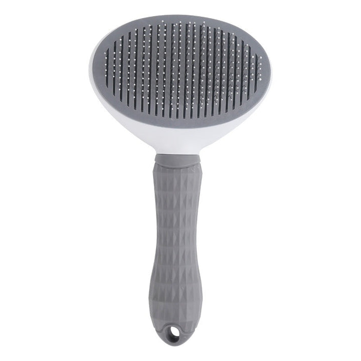 Self-cleaning pet grooming brush for dogs & cats, removes loose fur easily