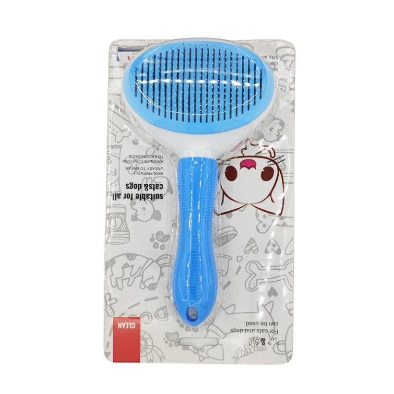 Close-up of pet grooming brush, showing self-cleaning button and bristles