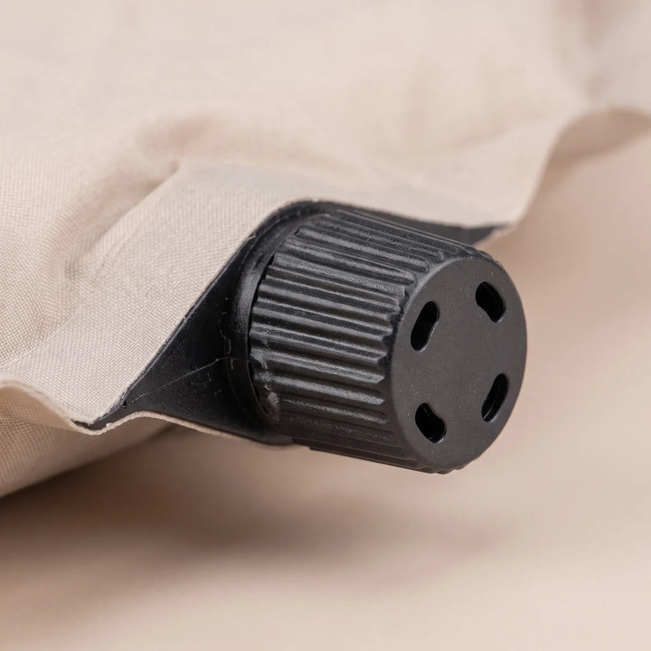 Durable self-inflating sleeping pad, designed for restful outdoor comfort during camping and hiking.