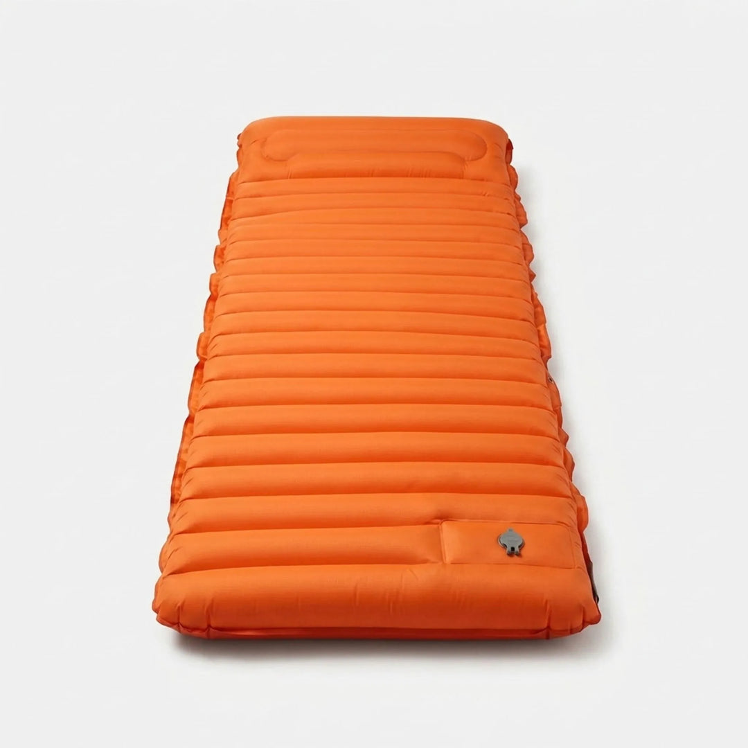 Compact, rolled-up self-inflating sleeping pad, ideal backpacking gear & camping essential for easy transport.