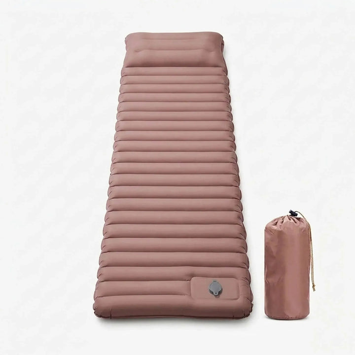 Close-up of the inflation valve on a self-inflating camping pad, highlighting easy setup for outdoor sleeping.