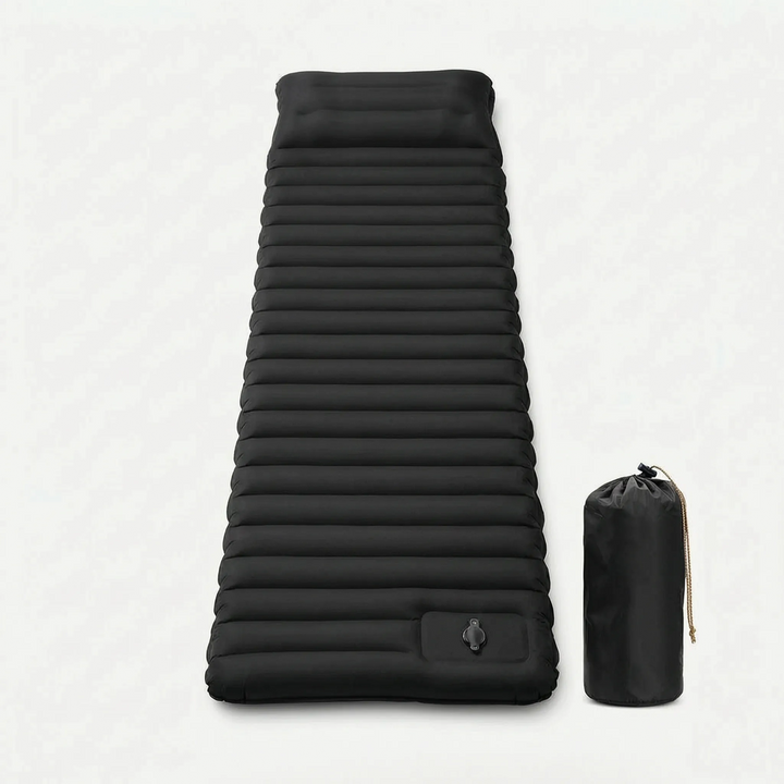 Self-inflating camping sleeping pad unrolling automatically, demonstrating quick & effortless setup for campers.