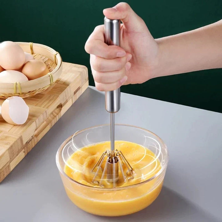 Semi-automatic stainless steel egg whisk, perfect for effortless kitchen mixing & beating.