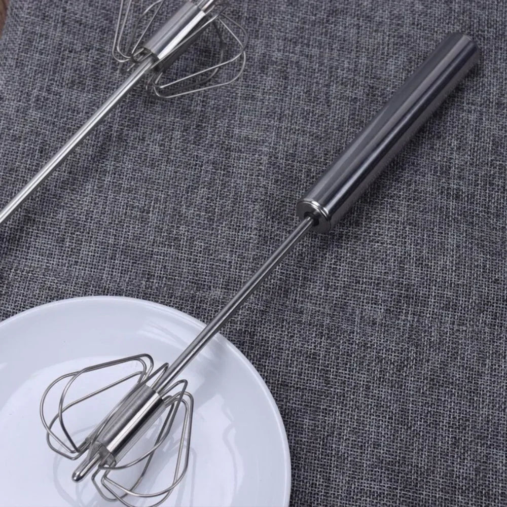 TwistWhisk semi-automatic egg whisk, a versatile kitchen tool for baking, cooking & mixing.