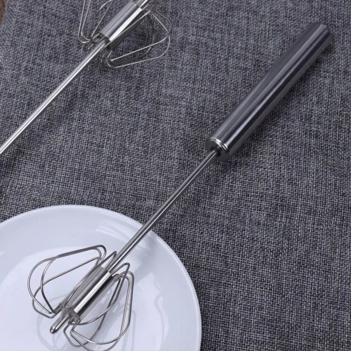 TwistWhisk semi-automatic egg whisk, a versatile kitchen tool for baking, cooking & mixing.