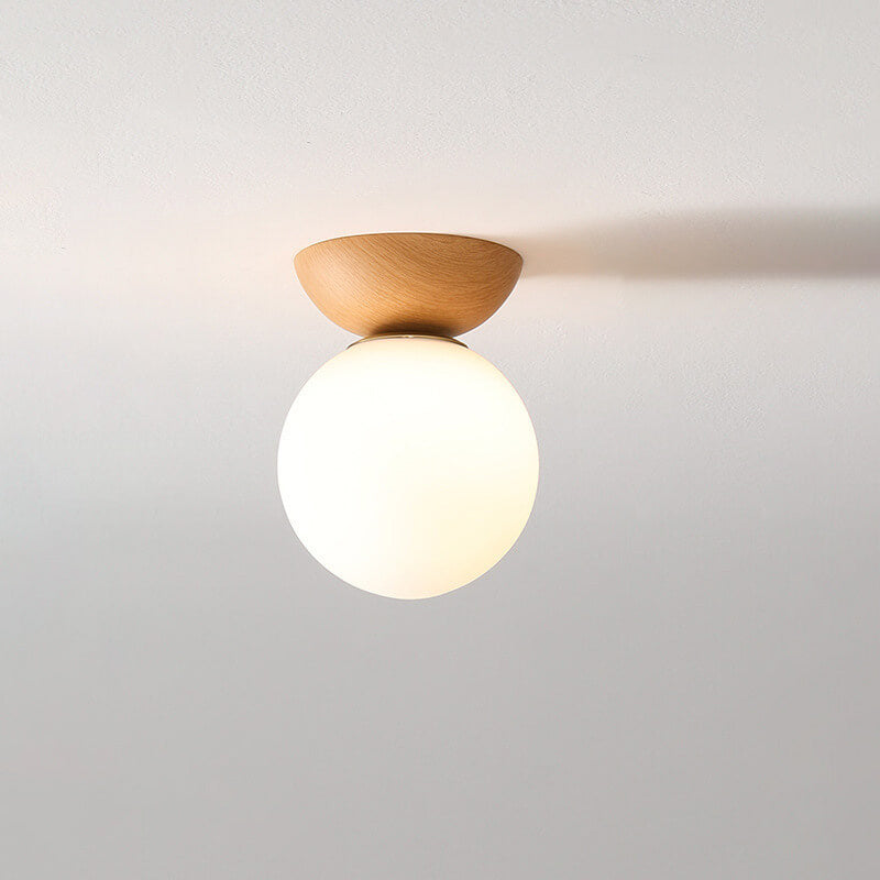 Japanese style LED ceiling lamp. Wood grain finish, serene and inviting home lighting.